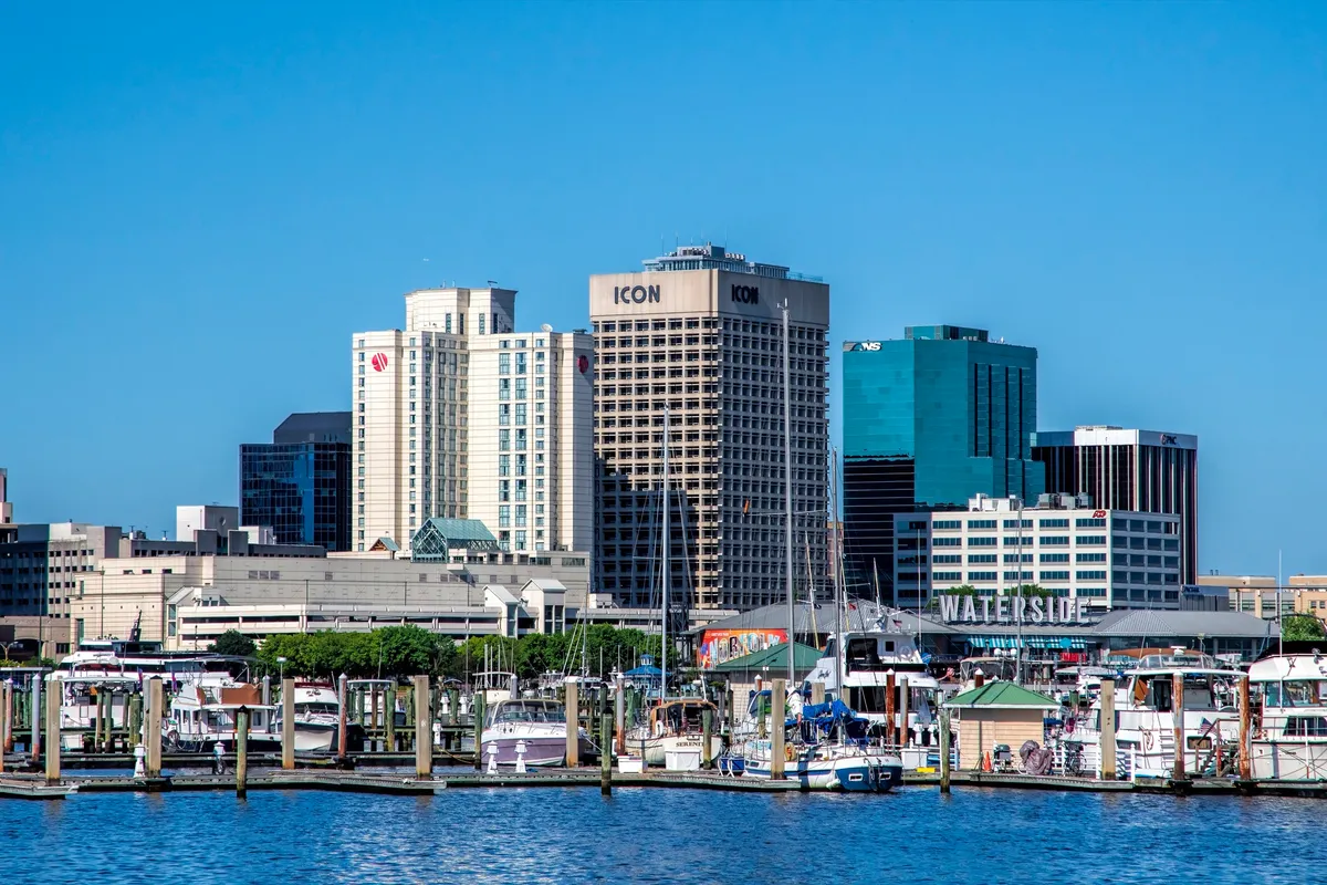 Downtown Norfolk, Virginia in daylight, with waterfront buildings along the Elizabeth River.